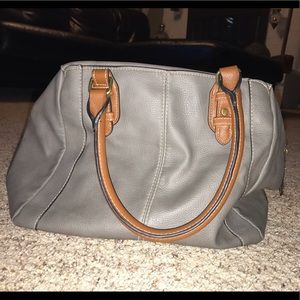 Grey and brown purse with matching wallet.